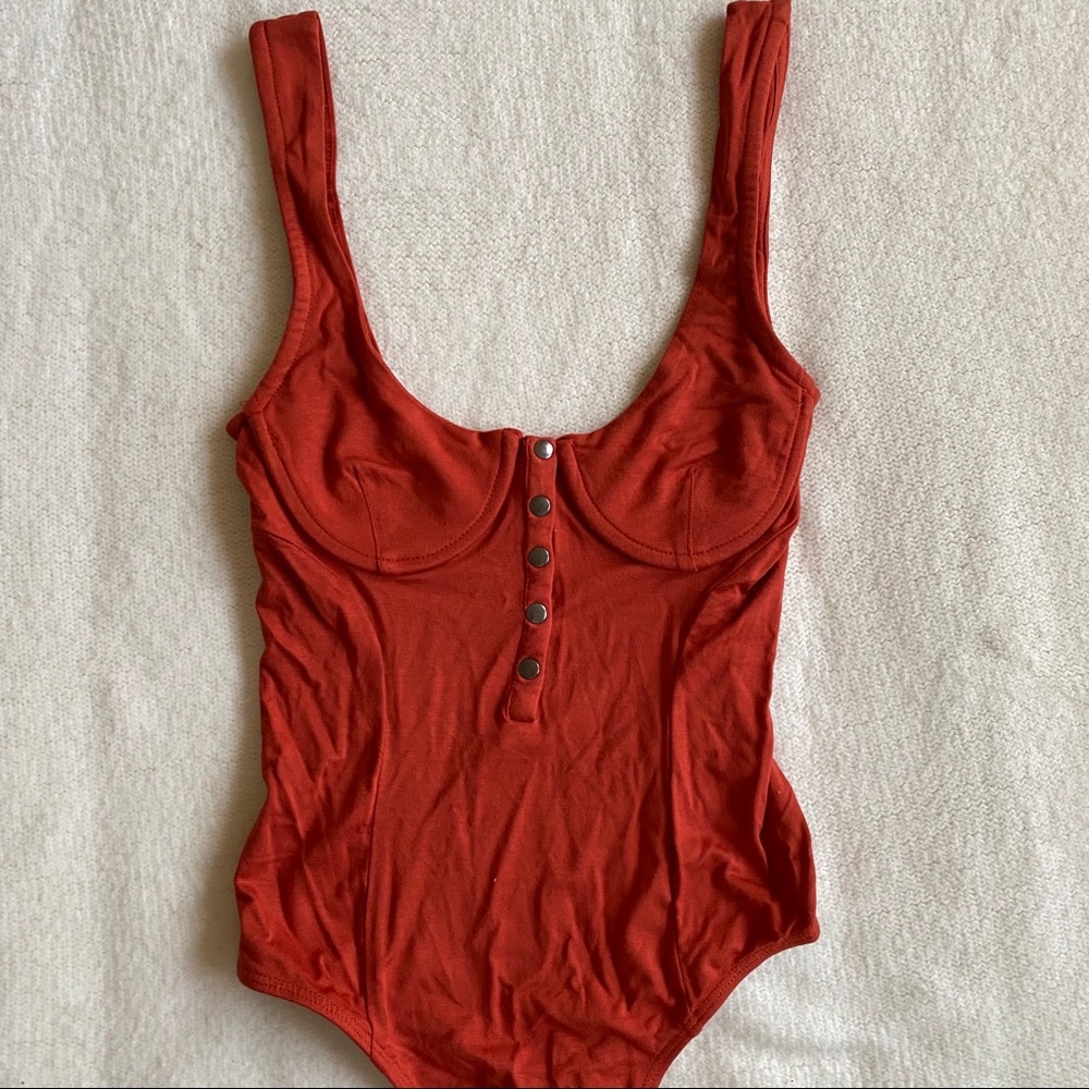 Burnt orange body suit 🧡
